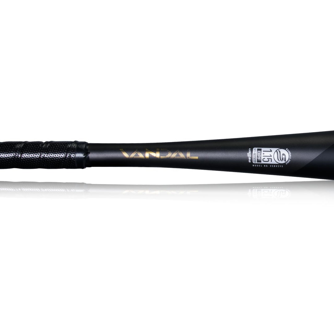 A close-up of the handle and barrel of the matte black 2022 Victus Vandal 2 (-8) USSSA Baseball Bat, featuring gold "Vandal" lettering, certification logos, and the Victus brand.