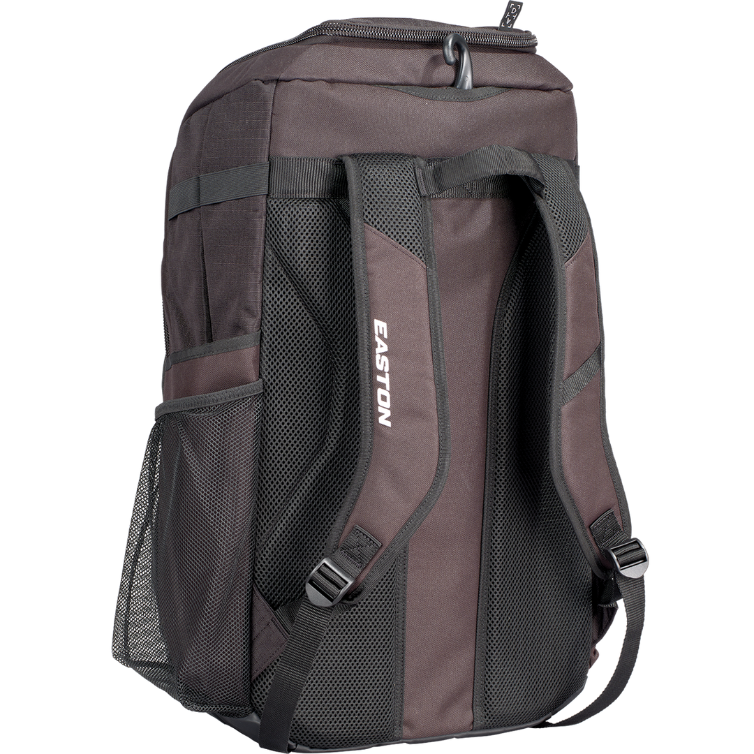 A black Worth Pro Backpack (WBA004) by Worth is shown from the back, featuring two padded adjustable shoulder straps, mesh side pockets, and a top carrying handle.
