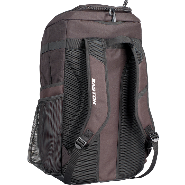A black Worth Pro Backpack (WBA004) by Worth is shown from the back, featuring two padded adjustable shoulder straps, mesh side pockets, and a top carrying handle.