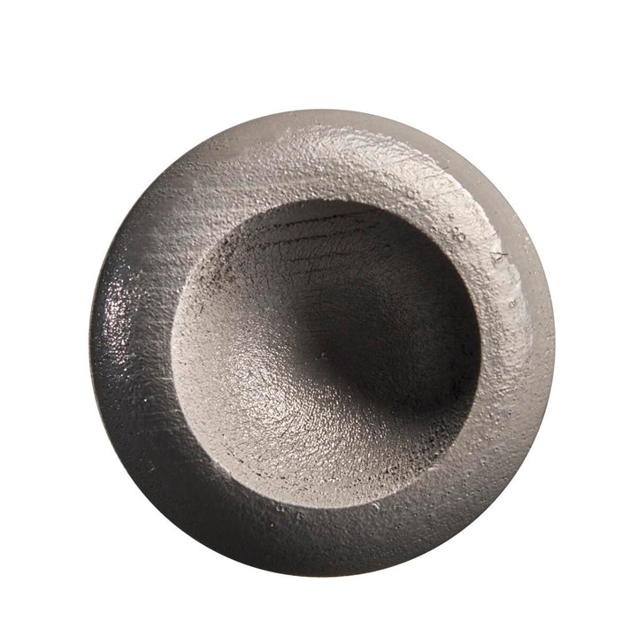 A round, metallic object with a rough, concave center resembling the end cap of the Louisville Slugger Youth Flylite Y243 Wood Baseball Bat: WBL2704010, is displayed against a white background.