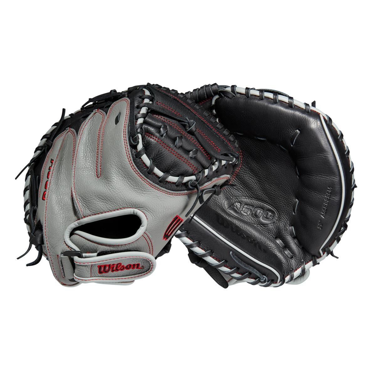 A Wilson A500 32" youth baseball catcher's mitt in gray and black top grain leather with red stitching, shown displaying both palm and back sides.