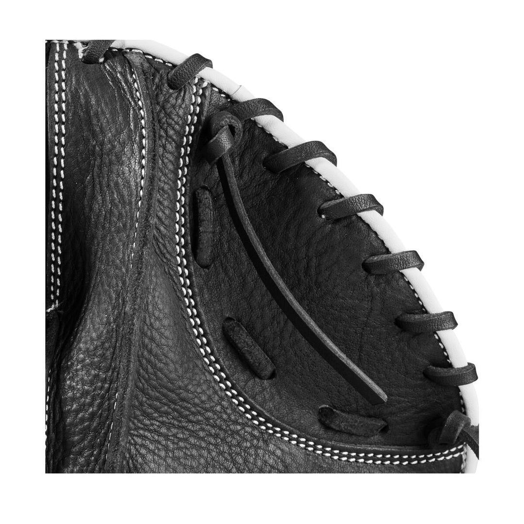 Close-up view of the Wilson 27.5" Infield Pancake Training Mitt (WBW100997275) in black, featuring white stitching and lacing details along the edge.