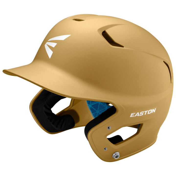 The Easton Z5 2.0 Grip Matte Solid Batting Helmet (Z52MT) features a gold matte finish, ear protection, ventilation holes, and a white front-left logo. NOCSAE certified for safety, it’s shown against a plain light background.