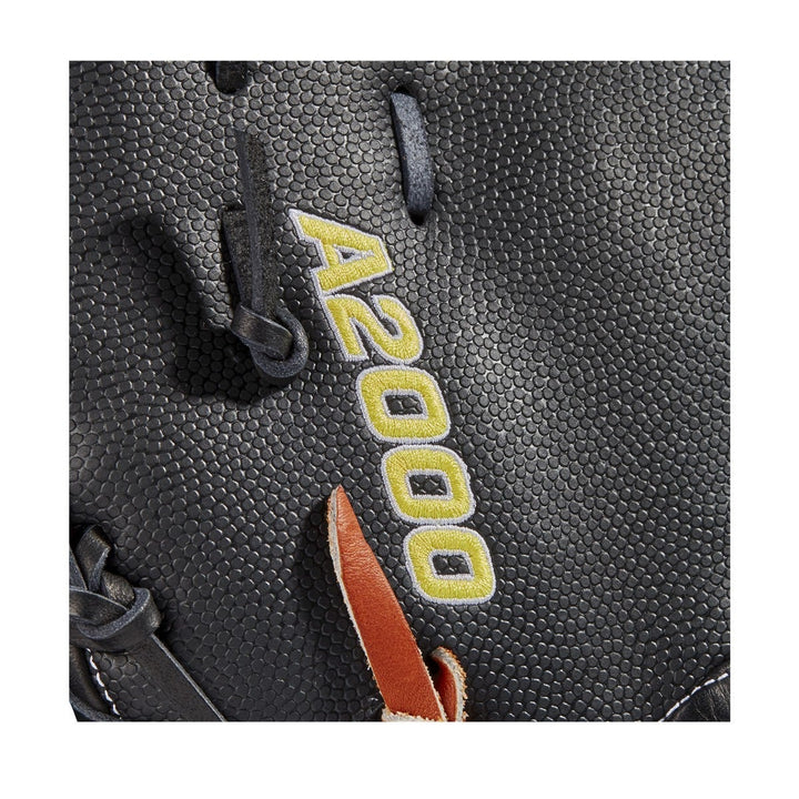 Close-up of the Wilson A2000 SC1620SS 12.5" SuperSkin First Base Mitt (WBW100123125), featuring black textured leather, brown and black laces, yellow and white "A2000" embroidery, and advanced SpinControl Technology.