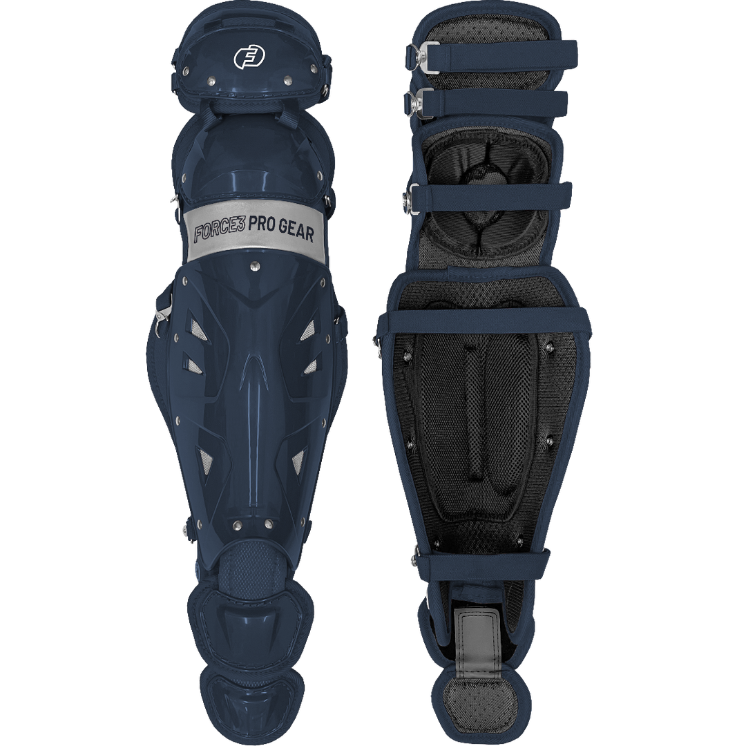A pair of Force3 Catcher's Leg Guards with Dupont Kevlar (model BC8), featuring navy blue exteriors, black padding, and adjustable straps. One displays "Force3 Pro Gear" branding; the other shows the padded interior.