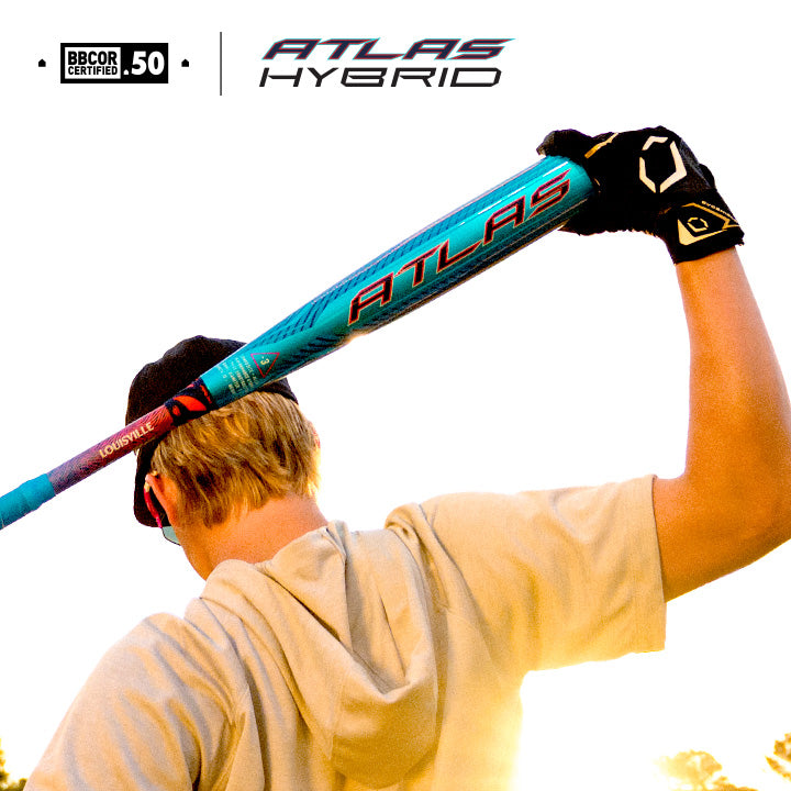 A person in a hoodie and glove holds the 2027 Louisville Slugger Atlas Hybrid (-3) BBCOR Baseball Bat (WBL4246010) over their shoulder, facing away. Logos and text are visible in the upper left corner.