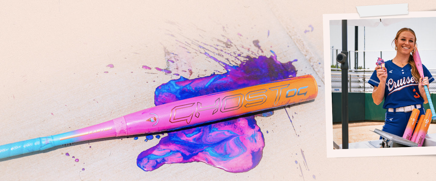 A colorful softball bat with “GHOST” written on it lies on a pink and purple paint splash; on the right, a smiling softball player in uniform holds the same bat at a ballpark.