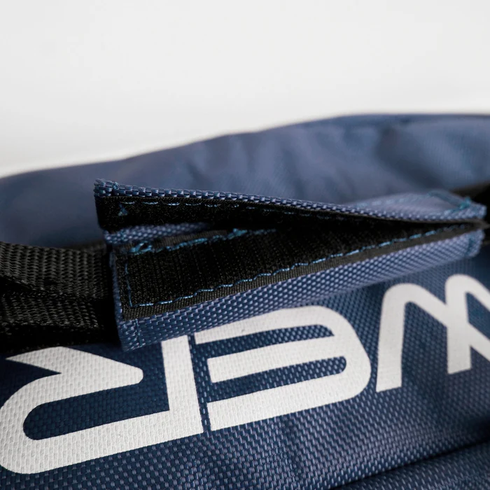 Close-up of the PowerNet 7' x 7' Deluxe Replacement Carry Bag (1094) in navy blue with black straps, visible stitching, white "WER" text, and overlapping flaps—perfect for storing your PowerNet 7x7 hitting or replacement net.