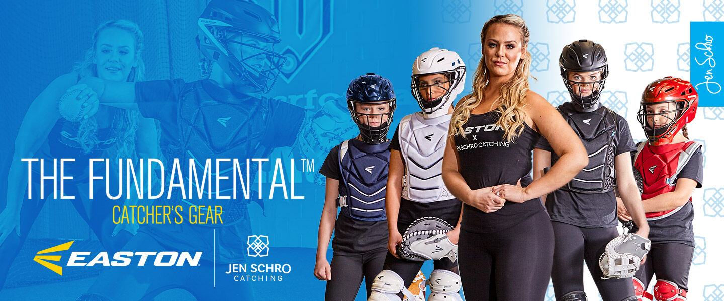A group of young baseball and softball catchers in protective gear stands with an adult coach in front of a blue background featuring the text The Fundamental Catchers Gear, Easton, and Jen Schro Catching.