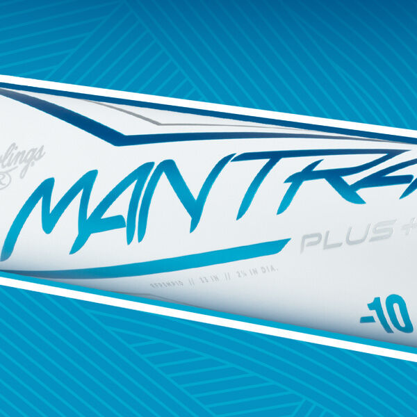 Close-up of a white softball bat with blue accents and the word “MANTRA” written in bold blue letters, set against a blue background with diagonal lines. The bat also displays “-10” and “PLUS” markings.