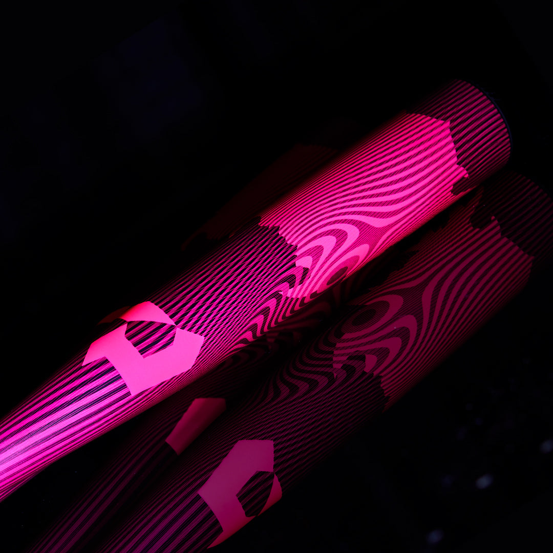 The 2024 DeMarini Voodoo One Neon Pink (-3) BBCOR Baseball Bat (WBD2557010) features an X14 Alloy Barrel for maximum performance in a sleek pink and black design.