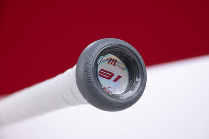 Close-up of the end cap on a Marucci CATX2 (-5) 2 5/8" USA Baseball Bat (MSBCX25USA), showing "31" under a clear cover. The bat has white grip tape and is set against a red and white background.