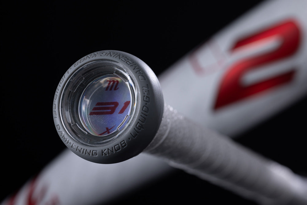 Close-up of the knob on the 2025 Marucci CATX2 JBB (-10) 2 3/4" USSSA Baseball Bat, showing "31" inside a clear cap, plus part of its white and red design and one-piece alloy construction. Brand: Marucci.