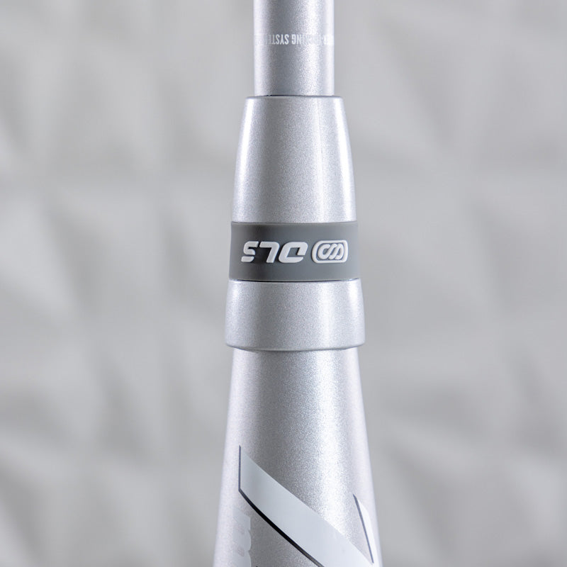 Close-up of a Marucci 2025 Echo Connect DMND2 (-10) fastpitch softball bat handle (MFPECD210), showing "S15" and a logo on a gray band, against a blurred textured background.