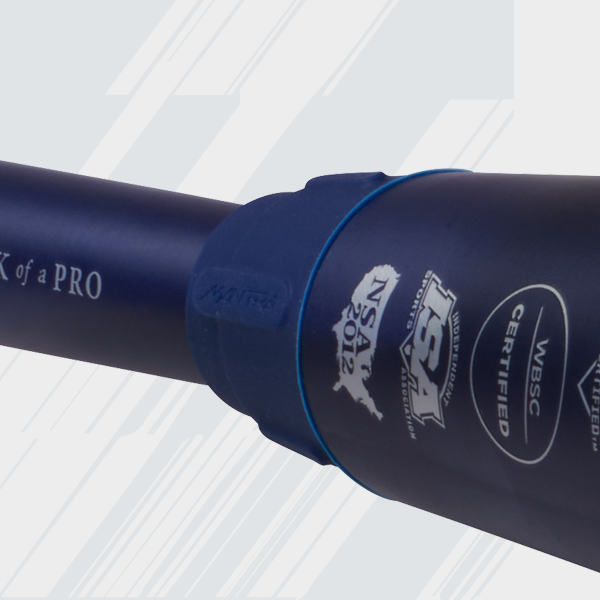 A close-up of a blue sports bat featuring certification logos, including NSA 2012 and WBSC Certified, and part of the word MANTRA on the barrel. The background is white with light blue diagonal lines.