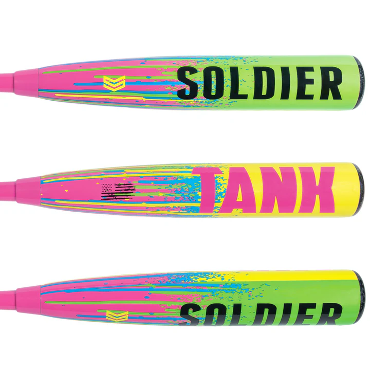 Three vibrant Soldier Sports 2025 Soldier Tank (-10) USSSA youth baseball bats with pink handles feature neon green, yellow, and pink splatter designs. Each large barrel shows bold black "SOLDIER" or "TANK" lettering.