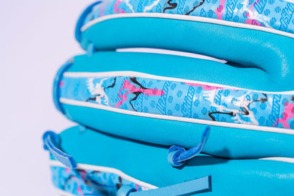 Close-up of three bright blue pool noodles stacked together, featuring a vibrant pattern inspired by Japanese-tanned steerhide leather used in the Marucci NightShift Blue Lizard 11.5" Baseball Glove (MFGNTSHFT-0405) from Marucci.