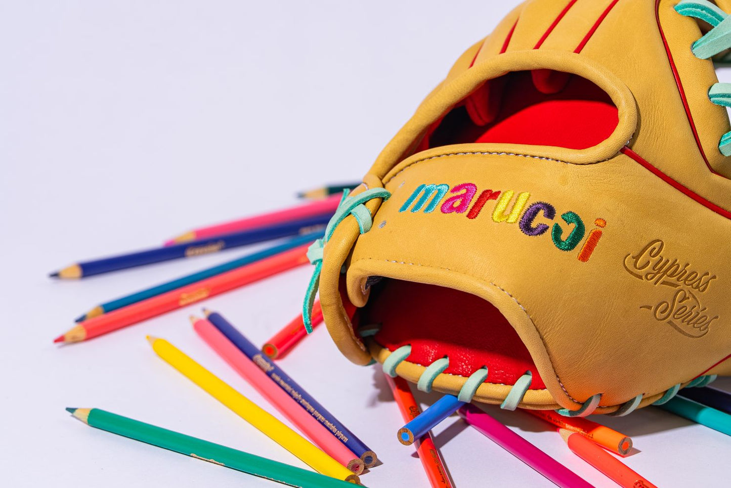 A Marucci NightShift Coloring Book 11.5" Baseball Glove (MFGNTSHFT-0404) by Marucci, inspired by creativity and vibrant colors.
