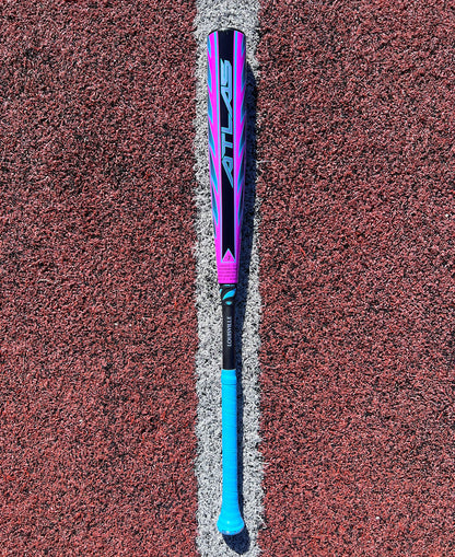 The 2026 Louisville Slugger Atlas Hybrid (-3) BBCOR Baseball Bat (WBL4114010) featuring a blue and pink design is centered on a red textured field, perfectly aligned with a white line beneath it.