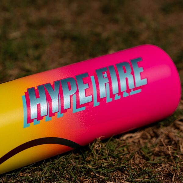 A close-up of the 2026 Easton Hype Fire (-5) 2 3/4" USSSA Baseball Bat (EUT6HYP5) by Easton, showing bold HYPEFIRE lettering on a vibrant yellow, orange, and pink gradient with advanced ThermoComposite technology.