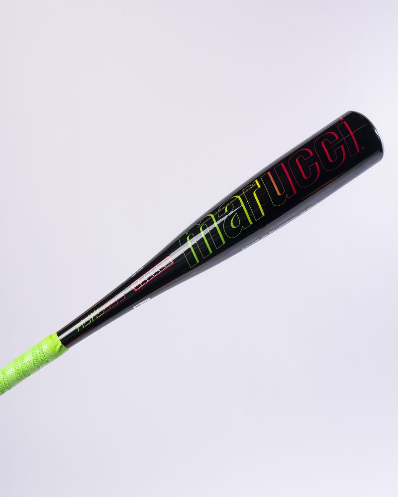 A 2027 Marucci RCKLESS Gen 2 Composite (-13) 2 5/8″ USA Tee Ball Baseball Bat (MTBRC2), featuring a black one-piece composite design, neon green grip tape, and the Marucci brand name in colorful letters on the barrel, set against a plain white background.