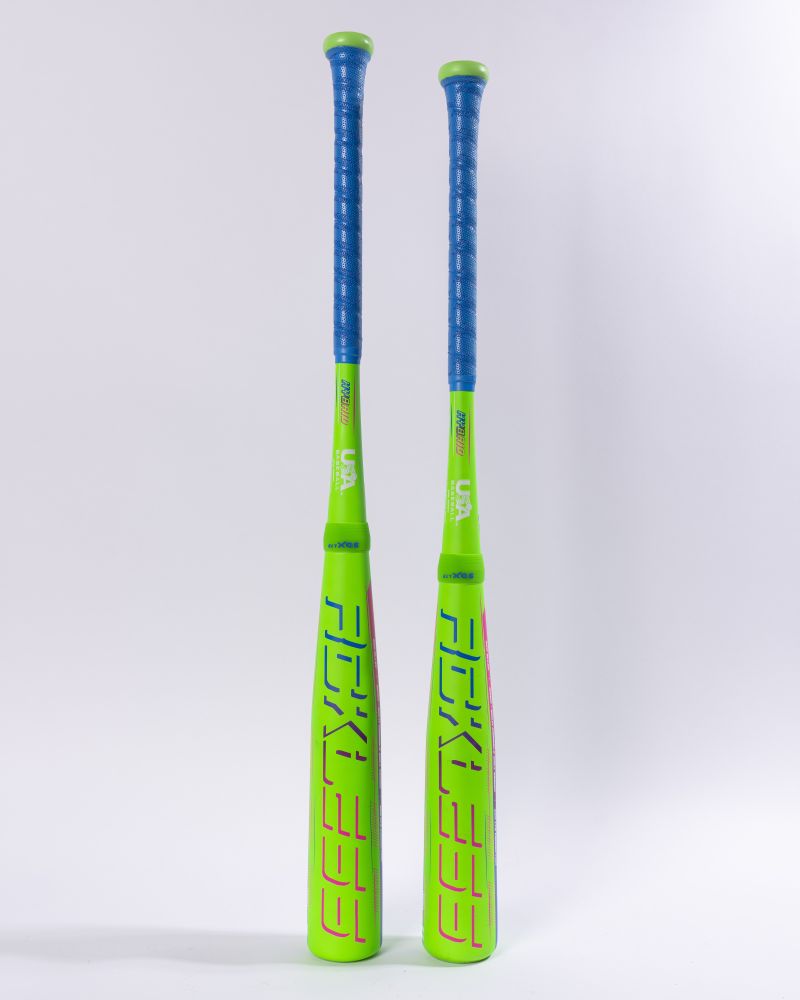 Two neon green Marucci RCKLESS Gen 2 Hybrid (-8) baseball bats with blue grips stand upright side by side against a plain white background. Featuring Ring-Free Barrel Construction, these Marucci bats display bold graphics and branding—highlighted in vibrant pink and black text—along their barrels.