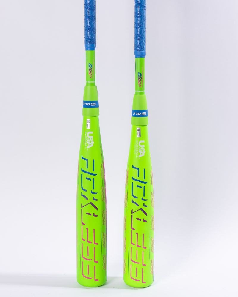 Two neon green Marucci 2027 RCKLESS Gen 2 Composite (-10) USA Baseball-certified bats stand vertically against a white background. Each bat features a durable composite barrel for maximum barrel flex, bold pink RCKLESS lettering running down the side, and is accented with bright blue grips and details.