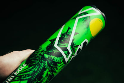 A hand holds a bright green tennis ball can with bold graphics—much like the eye-catching design of the 2026 DeMarini Exile Samurai (-3) BBCOR Baseball Bat: WBD2652010 by DeMarini.