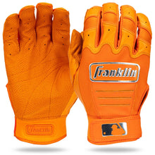 A pair of Franklin CFX Pro Full Color Chrome Adult Batting Gloves (205) in bright orange, made with premium sheepskin leather. Both palm and back are shown; the back displays the Franklin logo and an MLB logo patch near the wrist.