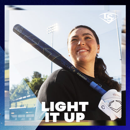 A woman stands ready with the 2025 Louisville Slugger LXT (-11) Fastpitch Softball Bat (WBL2993010), showcasing the confidence and power of a true softball competitor.
