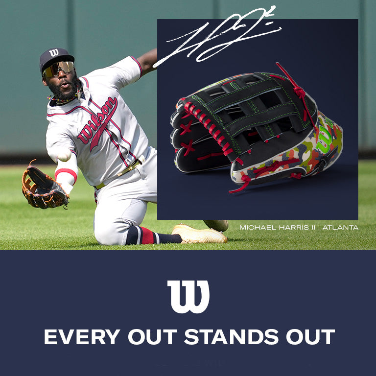 Atlanta Braves outfielder Michael Harris II slides for a catch. Inset: close-up of the Wilson A2K MH23 12.75" Michael Harris GM Baseball Glove, crafted with Pro Stock Select leather and vibrant accents. Text: EVERY OUT STANDS OUT.