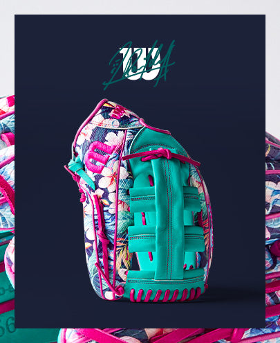 The Wilson A2000 RA56 12.75" Randy Arozarena GM Baseball Glove (SPRING 2025: WBW1026941275) features a colorful floral design, teal and pink accents, and pink lacing, shown upright on a dark blue background with the stylized W logo above.