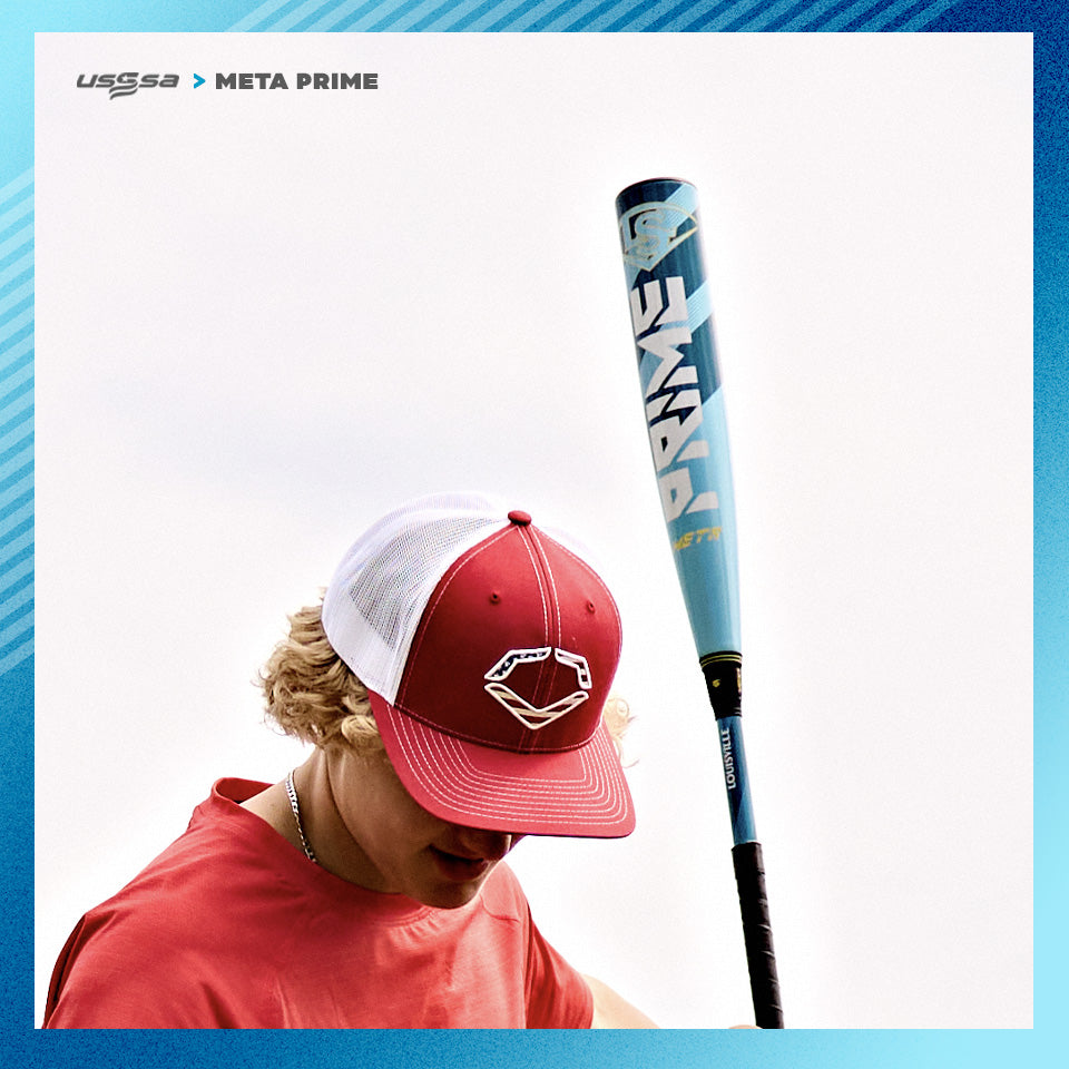 A person in a red shirt and red-and-white cap holds a blue 2025 Louisville Slugger Meta Prime (-8) USSSA Baseball Bat (WBL2971010 DEMO) upright against a white backdrop, with the Louisville Slugger and USSSA logos in the top left.