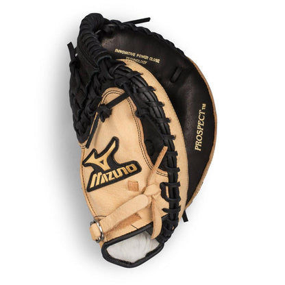 A tan and black Mizuno Prospect 32.5" GXC105 (311667) catcher's mitt with black laces, partially closed, features visible branding and stitching details.