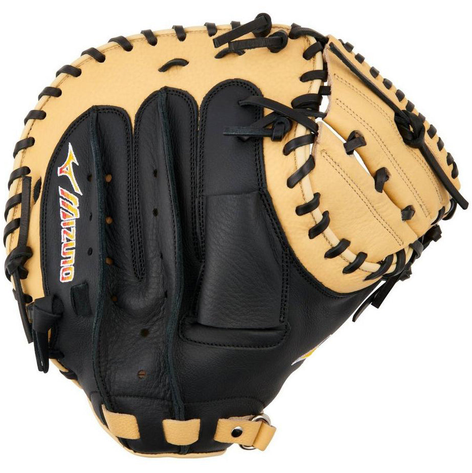 A Mizuno Franchise 33.5" Baseball Catcher's Mitt (GXC90B5) in black and tan full-grain leather is shown palm-side up, featuring visible stitching and edge laces.