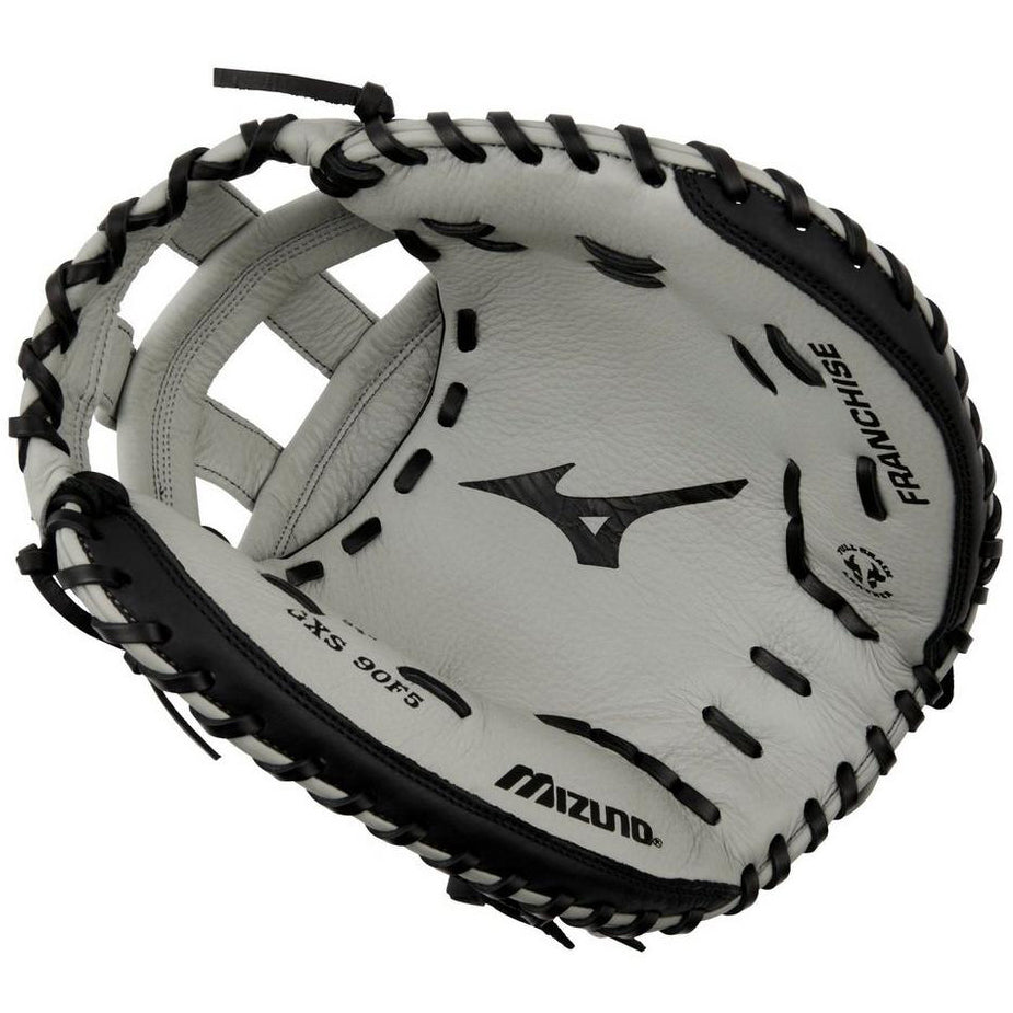 A black and white Mizuno Franchise 34" Fastpitch Catcher's Mitt (GXS90F5, 313245) made of full-grain leather features visible stitching, branding, and "FRANCHISE" printed on the glove’s outer edge.