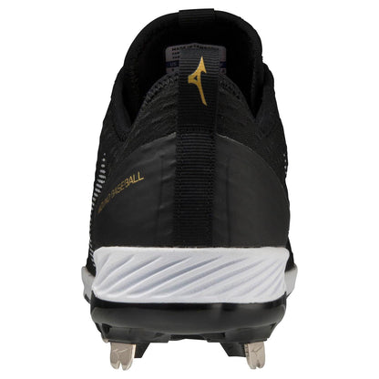 Rear view of black Mizuno Dominant 4 Men's Metal Baseball Cleats (320667) with a woven knit upper, white sole, silver metal spikes, gold Mizuno logo, and "MIZUNO BASEBALL" lettering on the side.