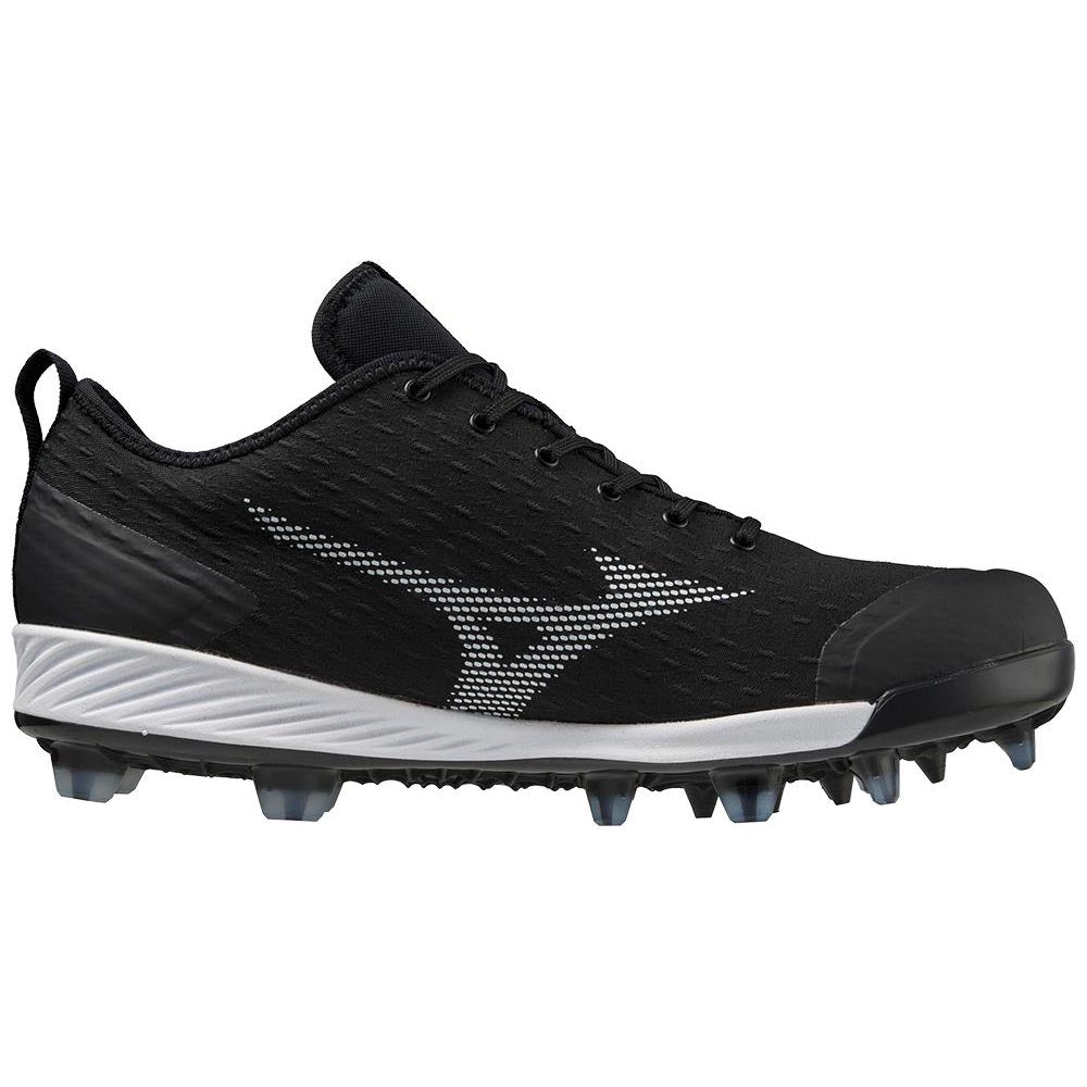 The Mizuno Dominant 4 Men's TPU Molded Baseball Cleats (320670) feature a black and white design, textured upper, lace-up closure, durable sole with small studs, and a bold Mizuno logo—ideal for top performance on the field.