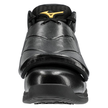 Front view of Mizuno Pro Wave Umpire Plate Shoes (320693) in black, with toe protection, thick top strap, gold Mizuno logo on the tongue, and a textured rubber sole.