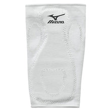 The Mizuno MZO Sliding Kneepad (370108) features white stretch fabric with visible stitching and padding for support and knee protection. The black Mizuno logo appears at the top center, ensuring athletic comfort during intense activity.