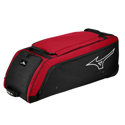 The Mizuno Samurai Wheeled Catcher's Bag (360327) is a large, rectangular red and black bag with a white Mizuno logo, zippered main compartment, sturdy handles, and wheels for easy transport.