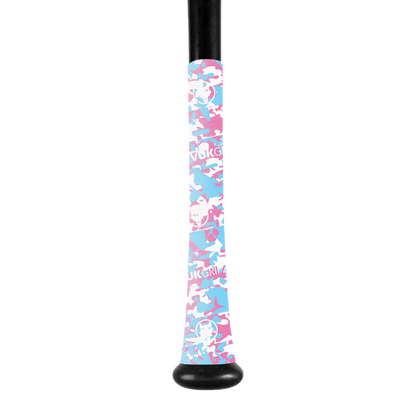 A VukGripz Bat Grip Tape by VukGripz is wrapped around a baseball bat handle, showcasing pink, blue, and white camouflage for optimal grip. The tape features the UKGRIP logo on a plain white background.