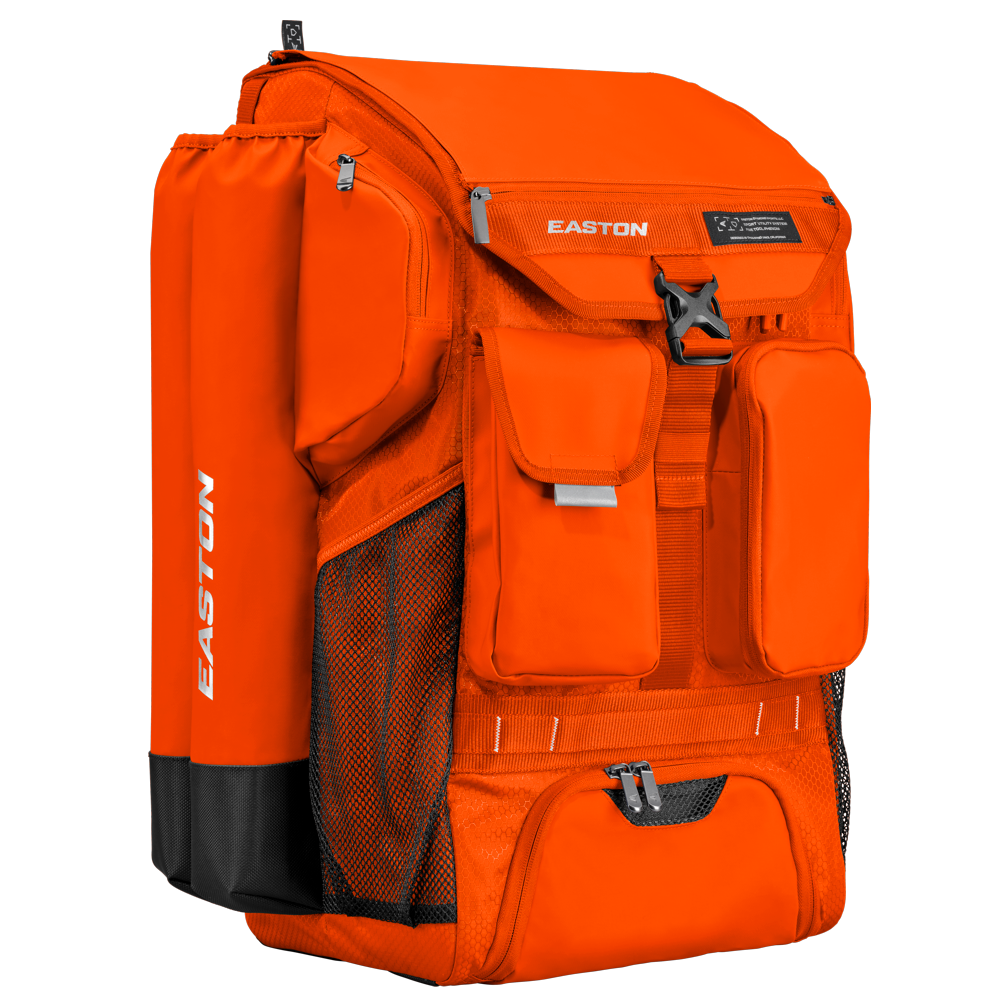 The Easton 5-Tool Phenom Backpack (5TPHENOMBP), in bright orange with EASTON branding, features multiple zippered compartments and mesh side pockets—a spacious baseball backpack shown on a plain white background.