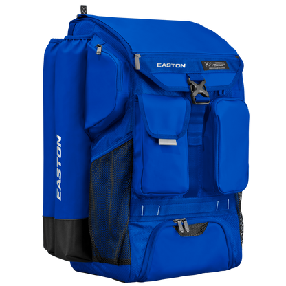 The Easton 5-Tool Phenom Backpack (5TPHENOMBP) features multiple zippered pockets, mesh side compartments, a bat holder, and Easton branding. This spacious blue backpack stands upright to showcase its versatile compartments.