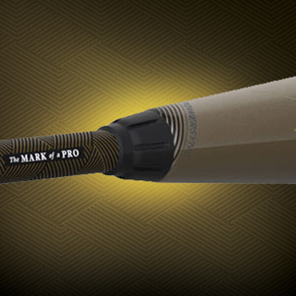 Close-up of a baseball bat handle with the text The MARK of a PRO on the grip, set against a gold geometric patterned background with a glowing highlight.