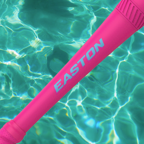 A 2025 Easton Hype Fire Pool Party (-5) 2 3/4" USSSA bat with bold white lettering floats above sunlit turquoise water, showcasing Thermo Composite Technology for peak performance.