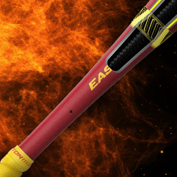 A close-up of a red and yellow baseball bat with the word EASTON on the handle, set against a vibrant, fiery orange background.
