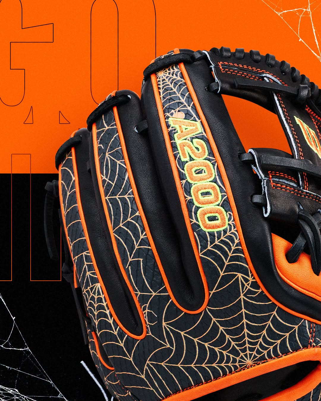 Black and orange Wilson A2000 1720SS 11.5″ Baseball Glove - GOTM October 2026: WBG31001RT115 featuring a spider web pattern and embroidered text on the fingers.