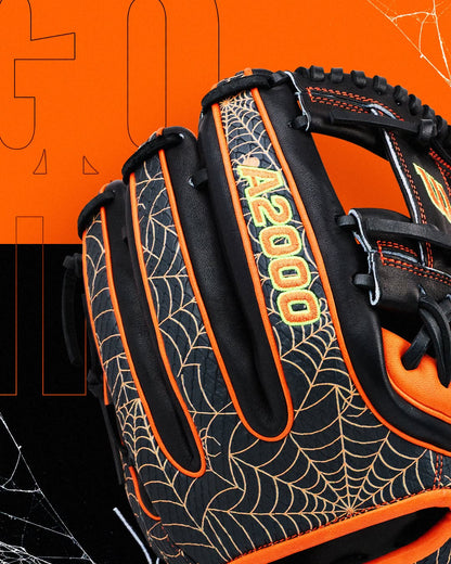 Black and orange Wilson A2000 1720SS 11.5″ Baseball Glove - GOTM October 2026: WBG31001RT115 featuring a spider web pattern and embroidered text on the fingers.