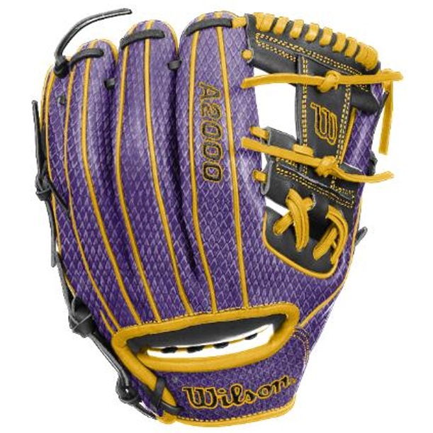 A Wilson A1000 1786 MAMBA 2.0 11.5″ baseball glove, WBG24701RT115, showcases vibrant purple and yellow coloring with black accents, highlighted by detailed stitching and prominent Wilson branding on both the palm and back. Expertly crafted from premium full-grain leather, this glove offers outstanding durability and a professional feel—perfect for dedicated infield players.